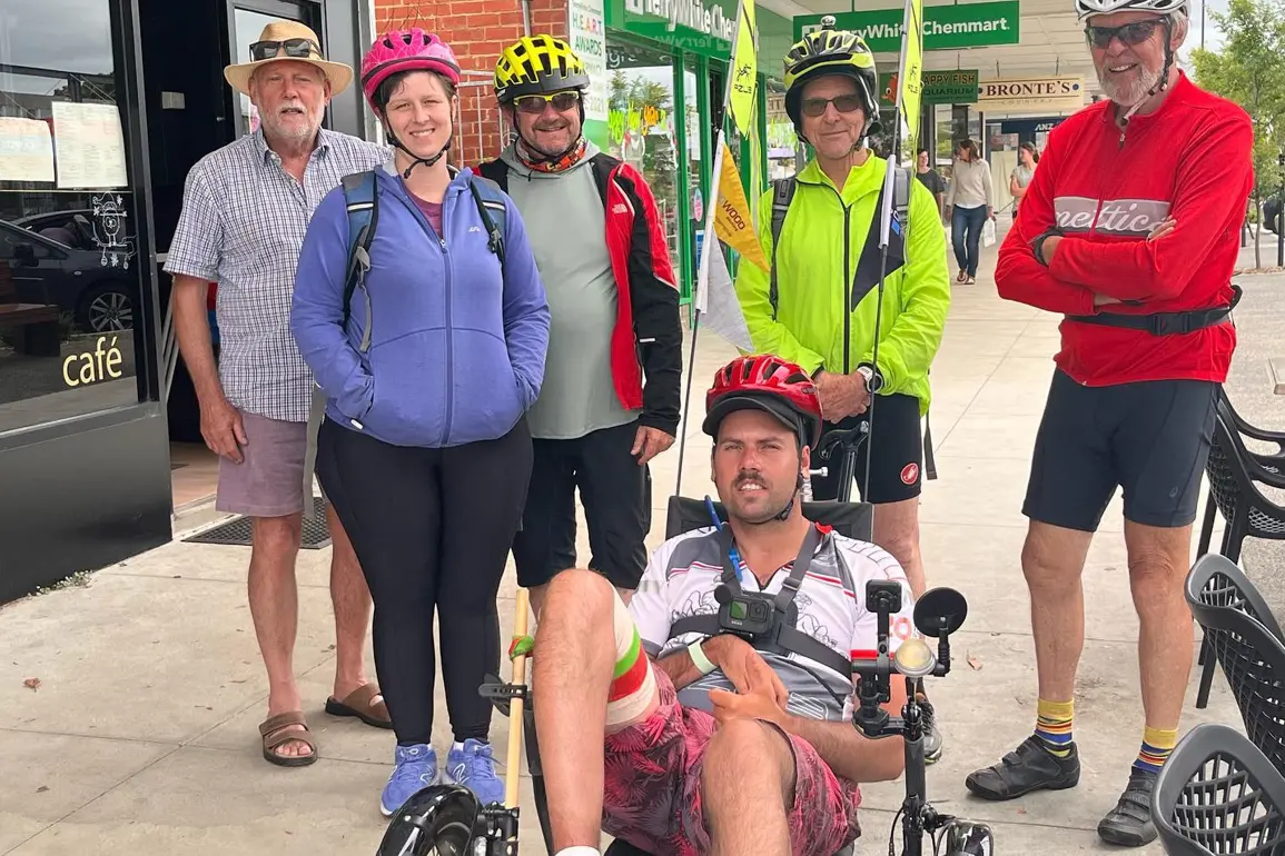 INSPIRATION: Stroke survivor Tommy Quick (seated in the trike) will continue his journey to the four furthest parts of the country, stopping in Euroa later this month. PHOTO: The 4 Points Australia Id:38450