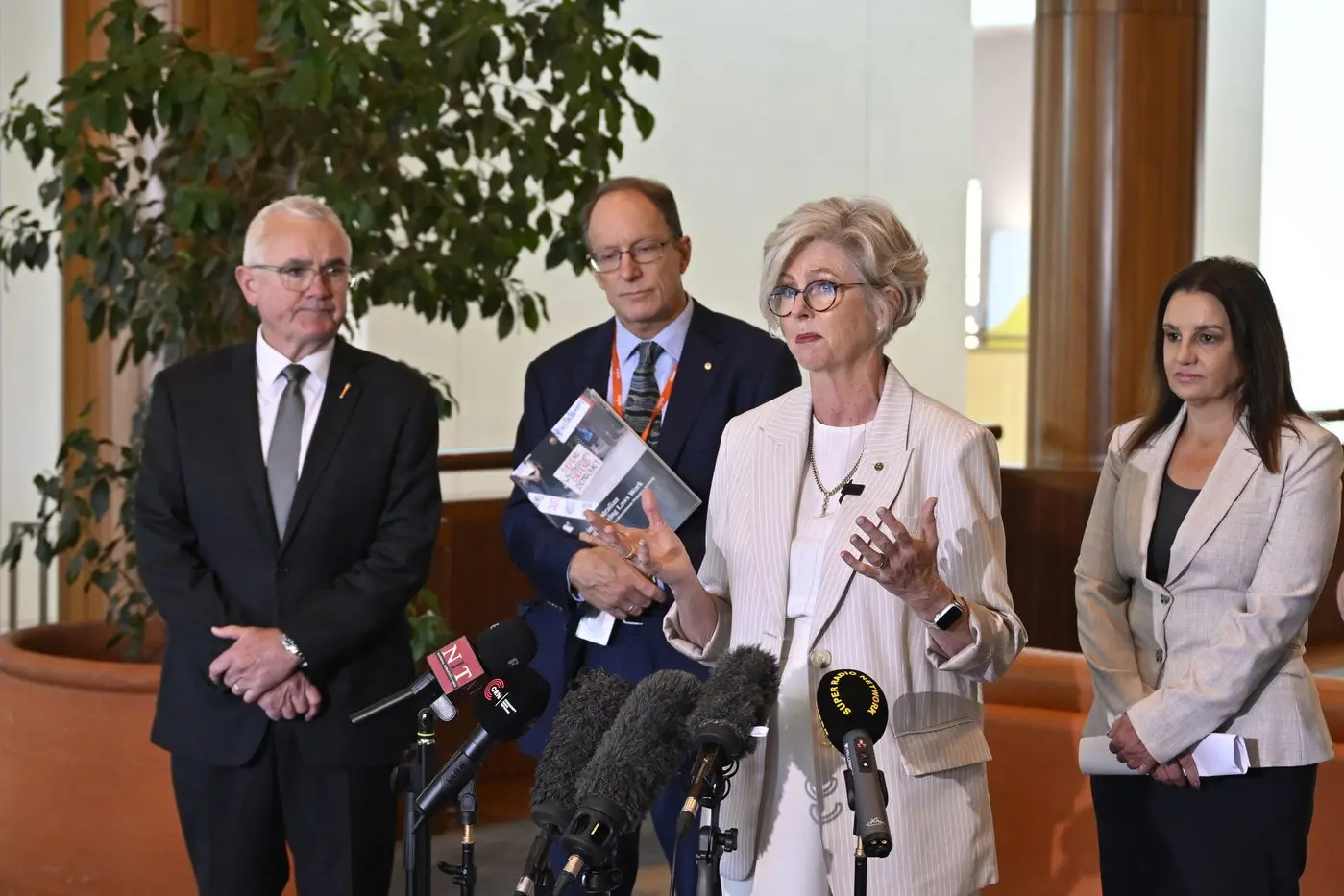 WE STAND BY YOU: Dr Helen Haines (MHR, Indi) speaks at a presser in Parliament House on Monday, flanked by other independents in support of the Bill, including Andrew Wilkie (MHR, Clark) (left), and Senator for ACT David Pocock, and Senator for Tasmania Jacqui Lambie. PHOTO: Auspic