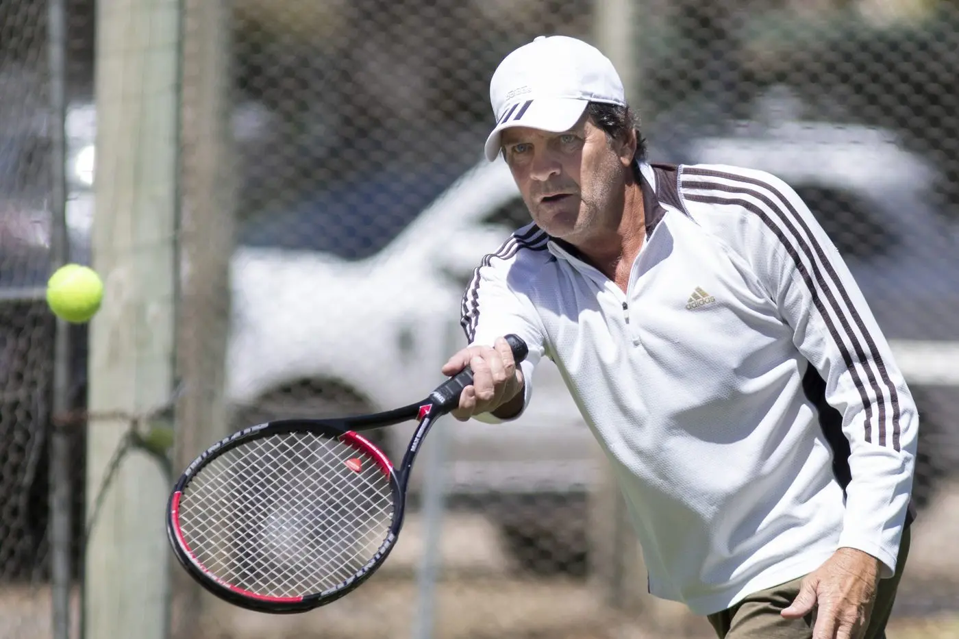 CAPTAIN\\u2019S HAND: David Vaughan expertly guides the ball over the net. PHOTOS: Dale Mann