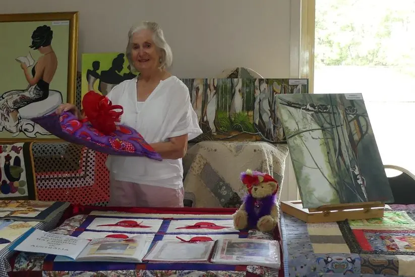 EXCLUSIVE ARTS: Nagambie artist Sonia Aspinall with her quilt and art display and Red Hat group information at the Kelvin Grove Art and Craft Show with a Difference on Saturday, March 25 at Nagambie. Id:39186