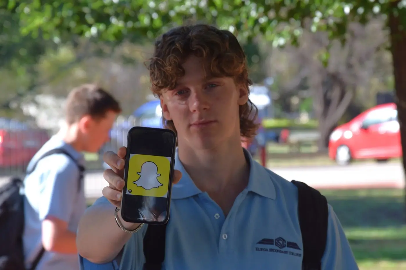 BANNED: The Federal Government has passed legislation banning people under 16 from social media platforms including Snapchat, as pictured on Jeremiah Johnston\\'s phone. \\u201CI am in complete and utter disagreement [with the ban],\\u201D the local year 10 student said. PHOTO: Darren Chaitman