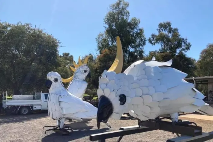 COCKATHREE: These sculptures of cheeky cockatoos draw many visitors to come to Longwood. Id:20572