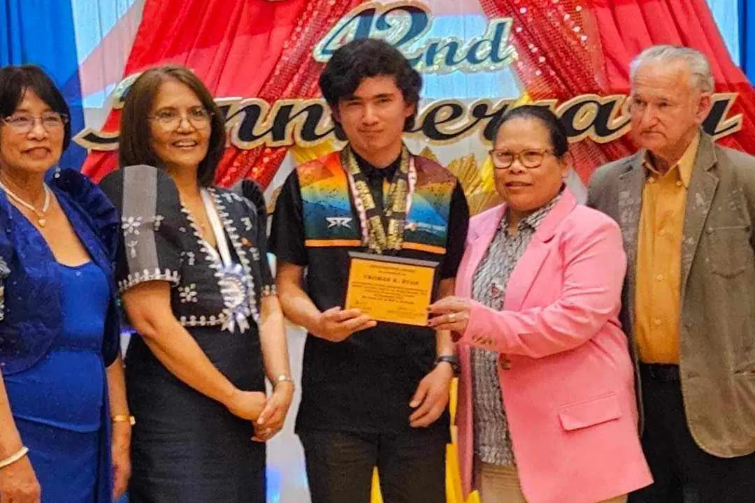 ATHLETIC ACHIEVEMENT AWARDED: Cathy Javier (left), Consul General Maria Lourdes Salcedo, Thomas Ryan, Edith Ryan and Mick Ryan.