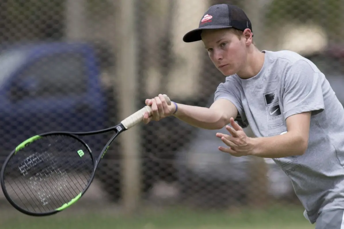 WILL THIS DO THE TRICK: Jack Vecht assuredly returns the ball. PHOTOS: Dale Mann