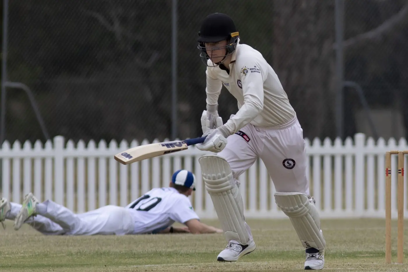 OFF THE MARK: Walter Jackson plays a shot through the field during the match against Old Students.\\nPHOTO: Dale Mann