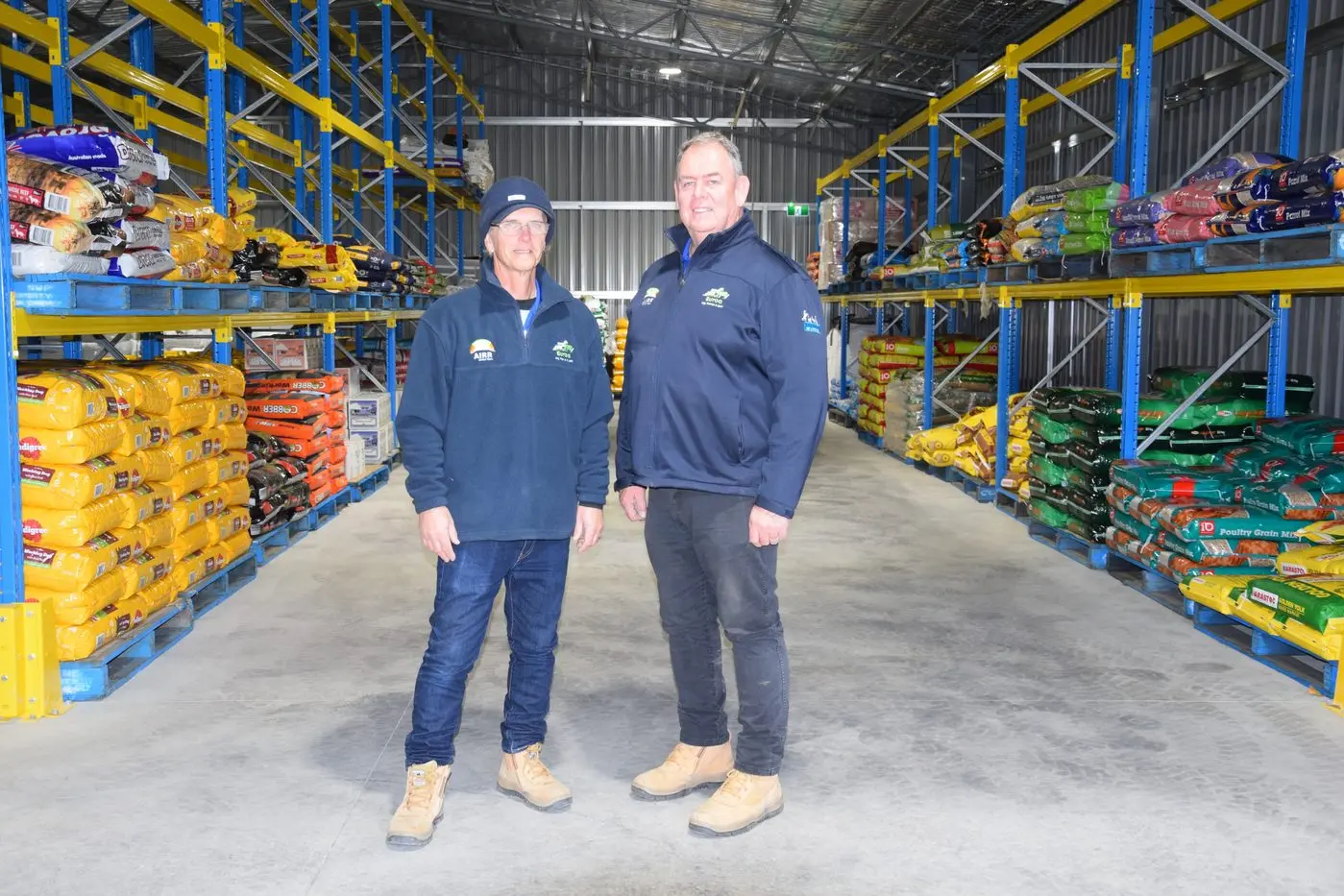 PLENTY OF STOCK: Chris Faria and Stewart Raine show off the huge storeroom at Euroa Ag, Horse & Pet. PHOTOS: Andy Wilson
