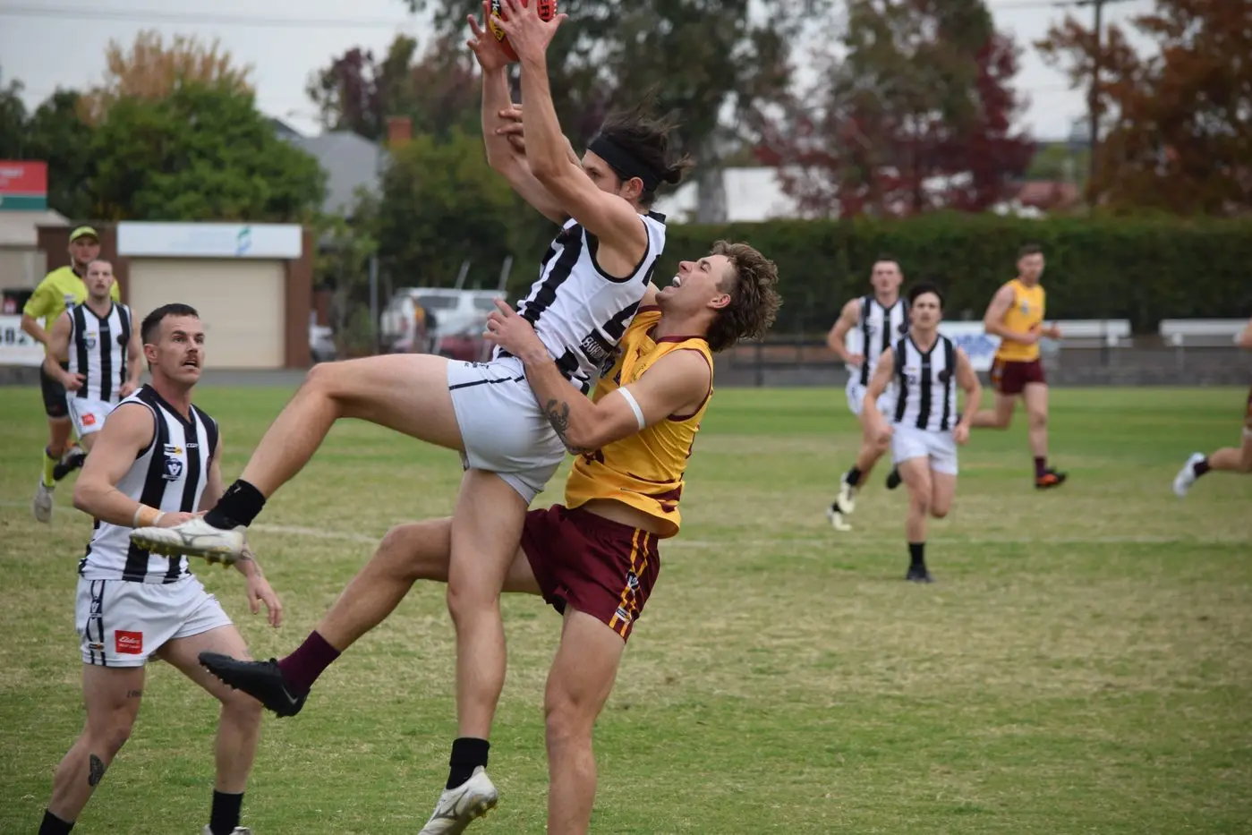 RIGHT POSITION: Tristan Davies takes a strong contested mark in front of this Shepparton opponent who attempts to spoil. PHOTOS: Raelee Jager