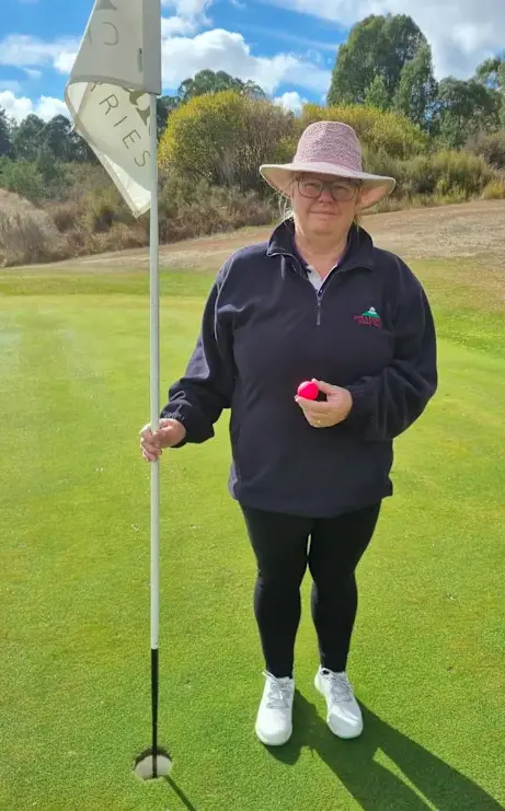 RUNS IN THE FAMILY: Kristen Moore celebrated in style after scoring her first hole in one.