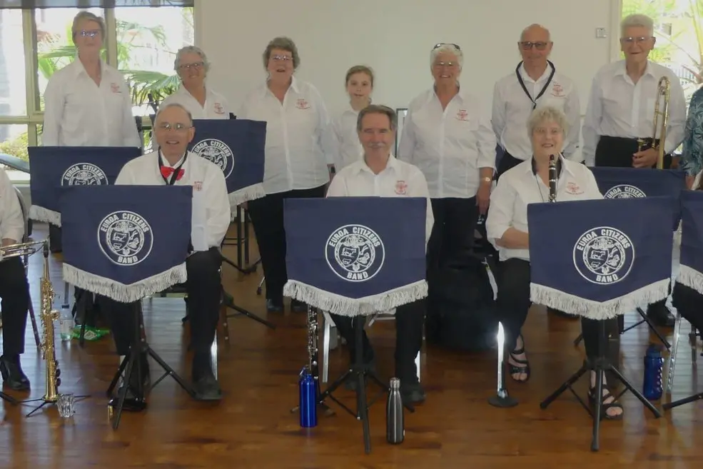 THE BAND: The Euroa Citizens Band at Kelvin Grove Village with resident Di Grant (right).