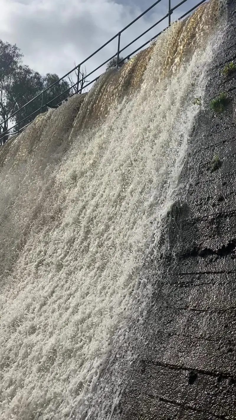 WATER, WATER EVERYWHERE: Mountain Hut reservoir, which is now spilling significantly for the first time since 2018.