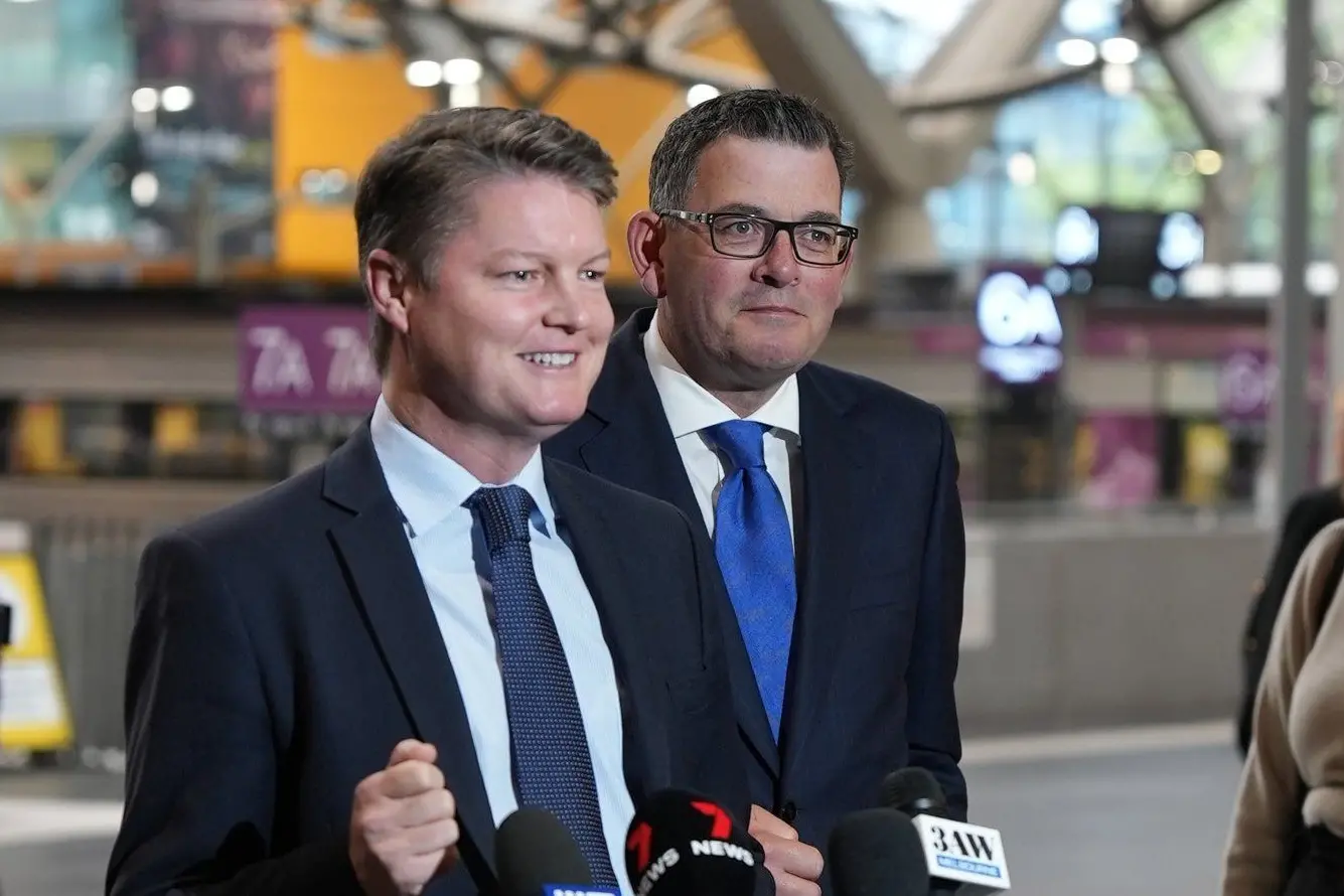 BOOK IT: V/Line travellers will be able to book a daily ticket to Melbourne and back for $9.20 from today, for travel from March 31, no matter where they live in the state. Pictured are Minister for Transport Ben Carroll and Premier Daniel Andrews at Southern Cross Station last week. Id:38985