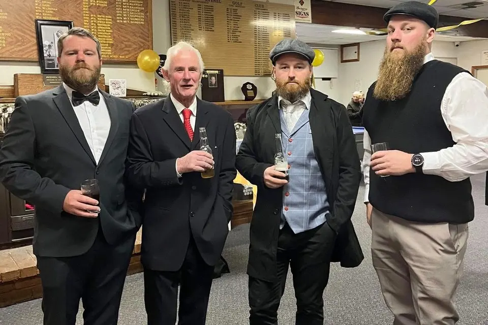 SERIOUSLY SWINGING: The gents were taking the night very seriously. Pictured are Alex Smith, Tim Batten, Andrew Croxford and Mark Hannigan.