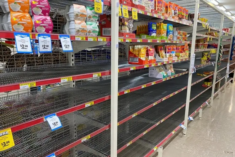 EMPTY SHELVES: Shelves at Burton\\'s IGA that stock rice and pasta are being emptied as customers rush to buy items amid the COVID-19 pandemic. PHOTO: Philippe Perez
