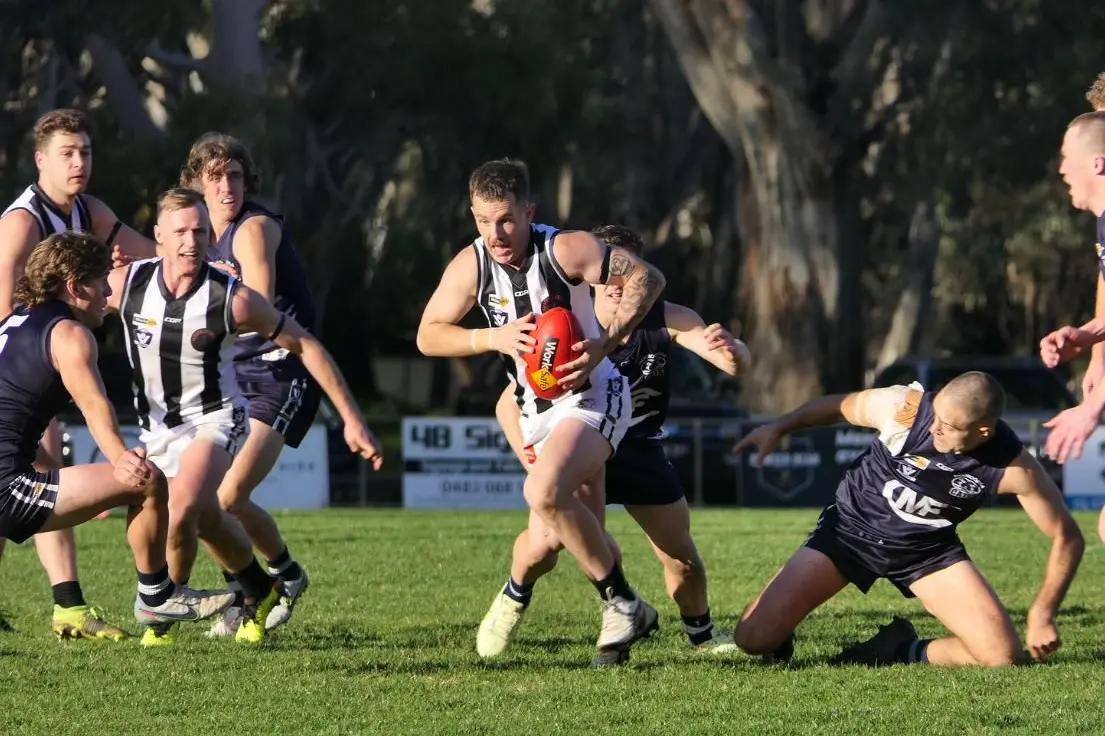 RUN AND CARRY: Jayden Gleeson seperates from his opponent who is in hot pursuit. PHOTOS: Raelee Jager 