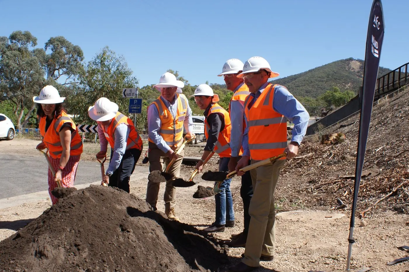 WE\\'RE AWAY: Strathbogie Shire mayor Laura Binks (far left), Mark Campbell from ARTC, Dr David Sims from construction contractor McDonnell Dowell, Inland Rail interim CEO Rebecca Pickering, Wangaratta mayor Dean Rees and Wodonga mayor Ron Mildren turn the first sod at Glenrowan. PHOTOS: Belinda Harrison Id:36826