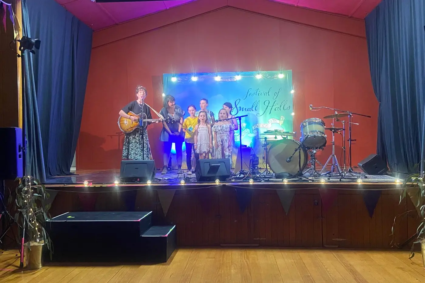 TO THE PARENTS\\' DELIGHT: Lucy Farrell with five of the students from Avenel Primary School who accompanied her with her first song. PHOTO: Merrill Boyd