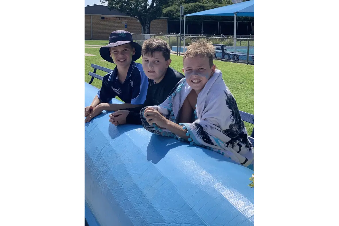BLUE MOOD: William Davies, Tyler Delahey and Oliver Wilson were ready to do battle for their team.