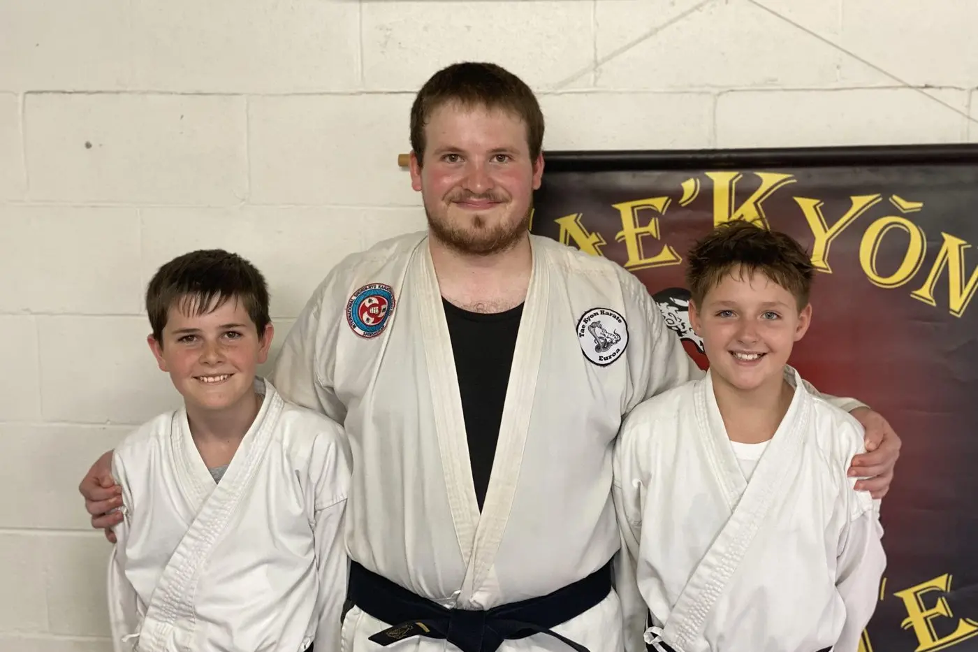 BLACK BELT: Theo Perry, Elliot Patterson, and Parker Jeffrey ascend to the next level of mastery.