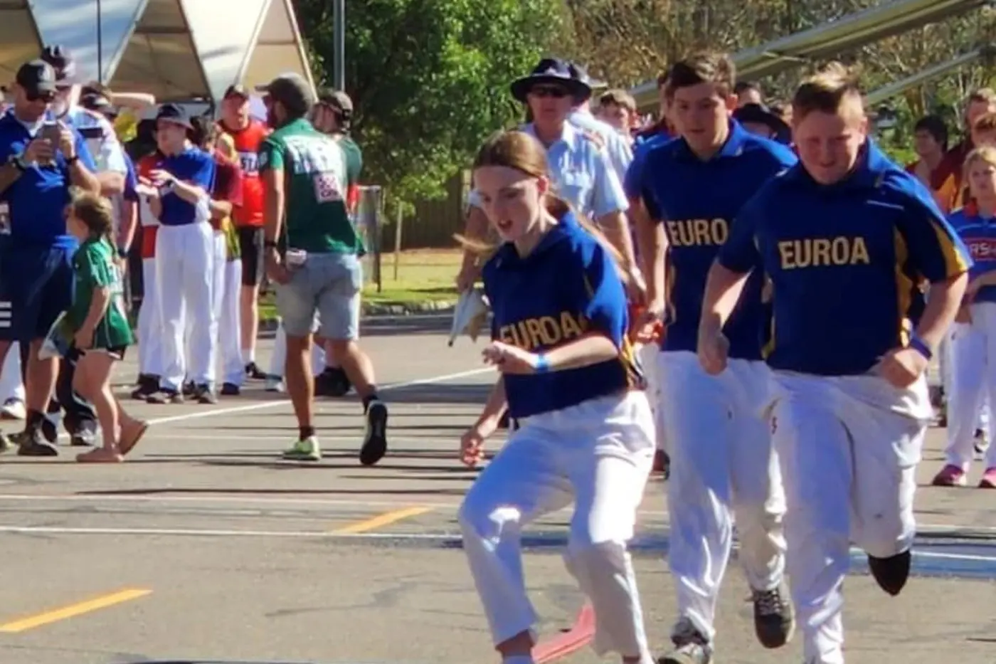 TRACK ACTION: Charlotte Davies, Tyler Delahey, and Will Mann show plenty of determination as they sprint down the main track.