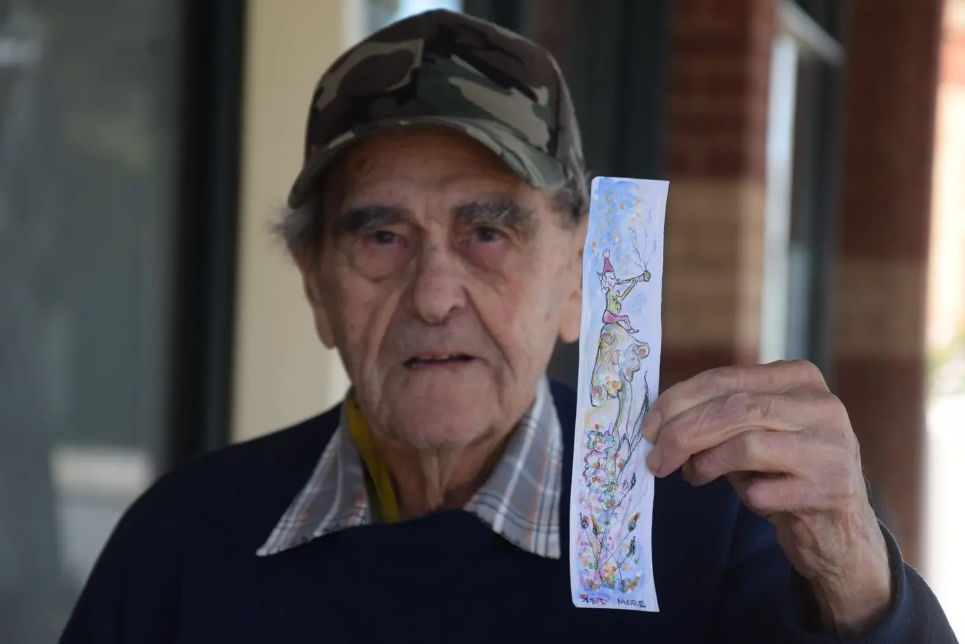 MORE TALENTS: The 90-year-old Ted More, who reguarly writes letters to The Euroa Gazette, with one of his bookmarks. PHOTOS: Darren Chaitman