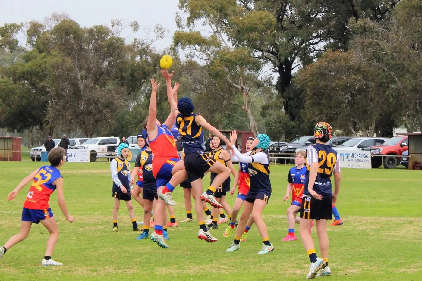 STRONG OVERHEAD: Violet Town players compete fiercely during the Gala Day.