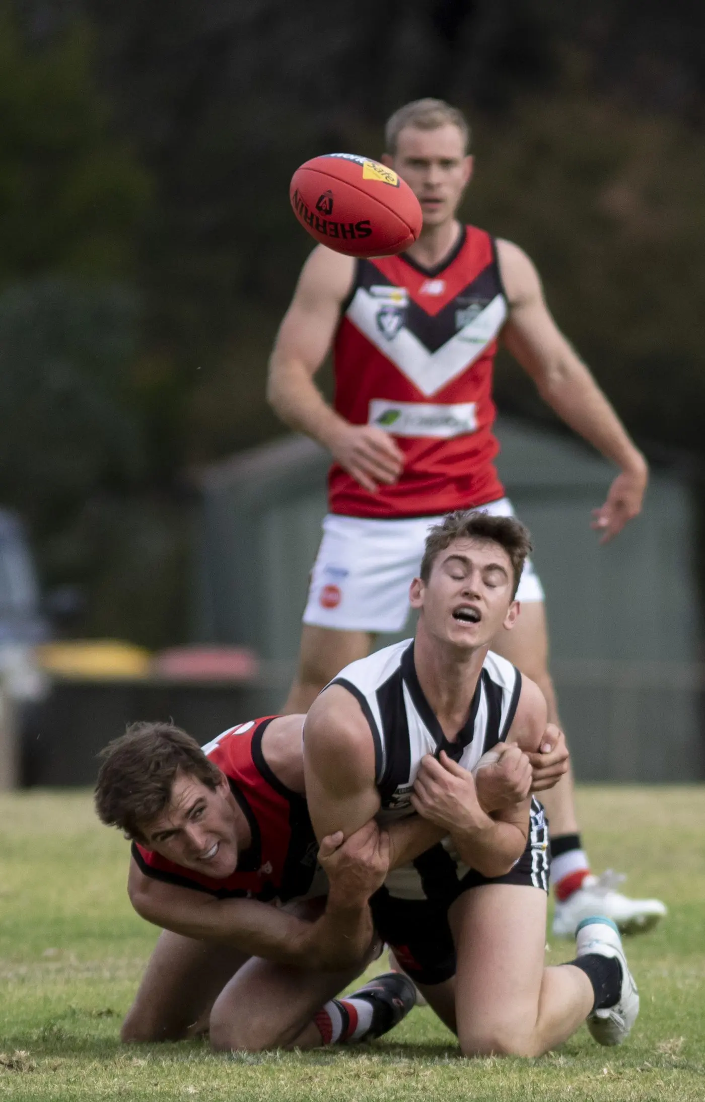 IN THE BACK: Jack Frewen gets physical against the Saints. PHOTOS: Dale Mann