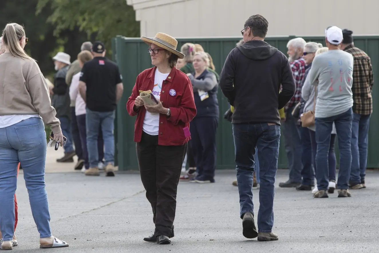 HOPEFUL FOR CHANGE:  Euroa\\'s Kate Auty supporting the Yes vote at the St John\\'s Primary School polling station in Euroa. PHOTOS: Dale Mann