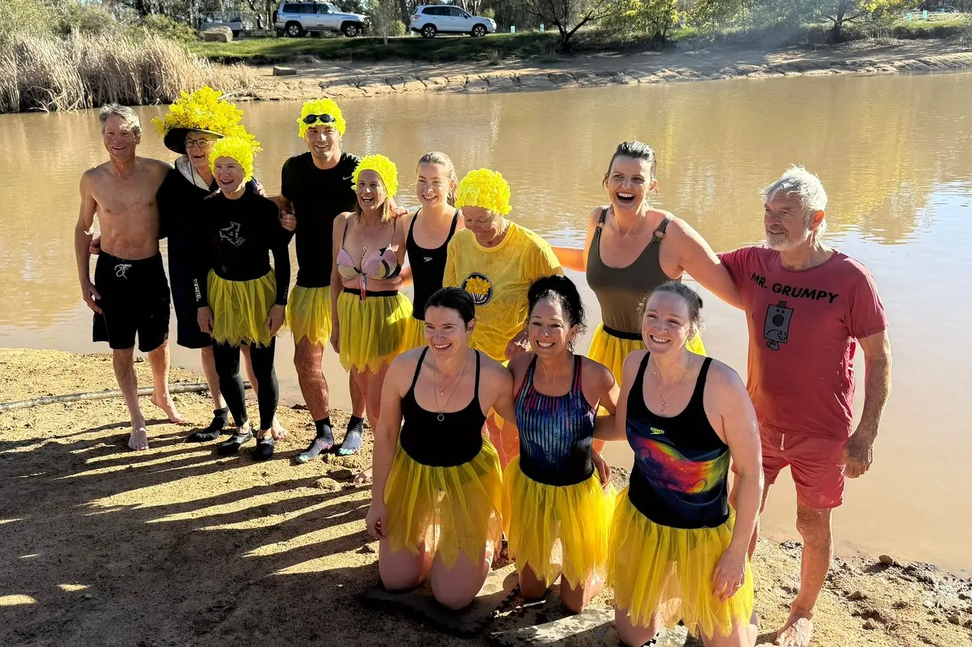 DAFFODIL DAY DIP: The \\u201CDam Dunkers\\u201D braved the chilly waters of the Euroa Arboretum dam, raising more than $3500 for the Cancer Council\\u2019s Daffodil Day appeal. PHOTO: Annabelle Cleeland MP