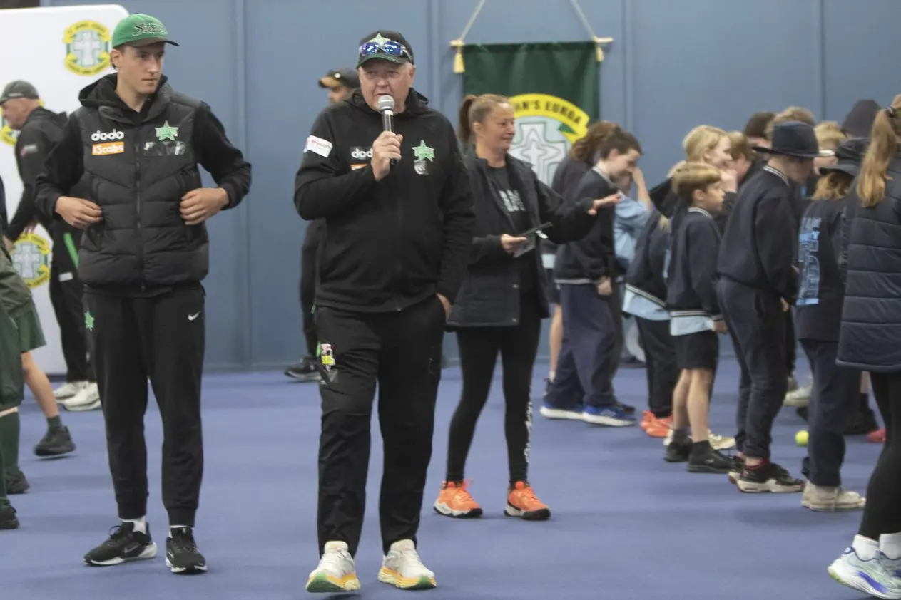 TAKING CHARGE: Douglas Warren, Stephen Box, and Lily Osbourne lead St John\\u2019s students through fun cricket activities. PHOTOS: Dale Mann