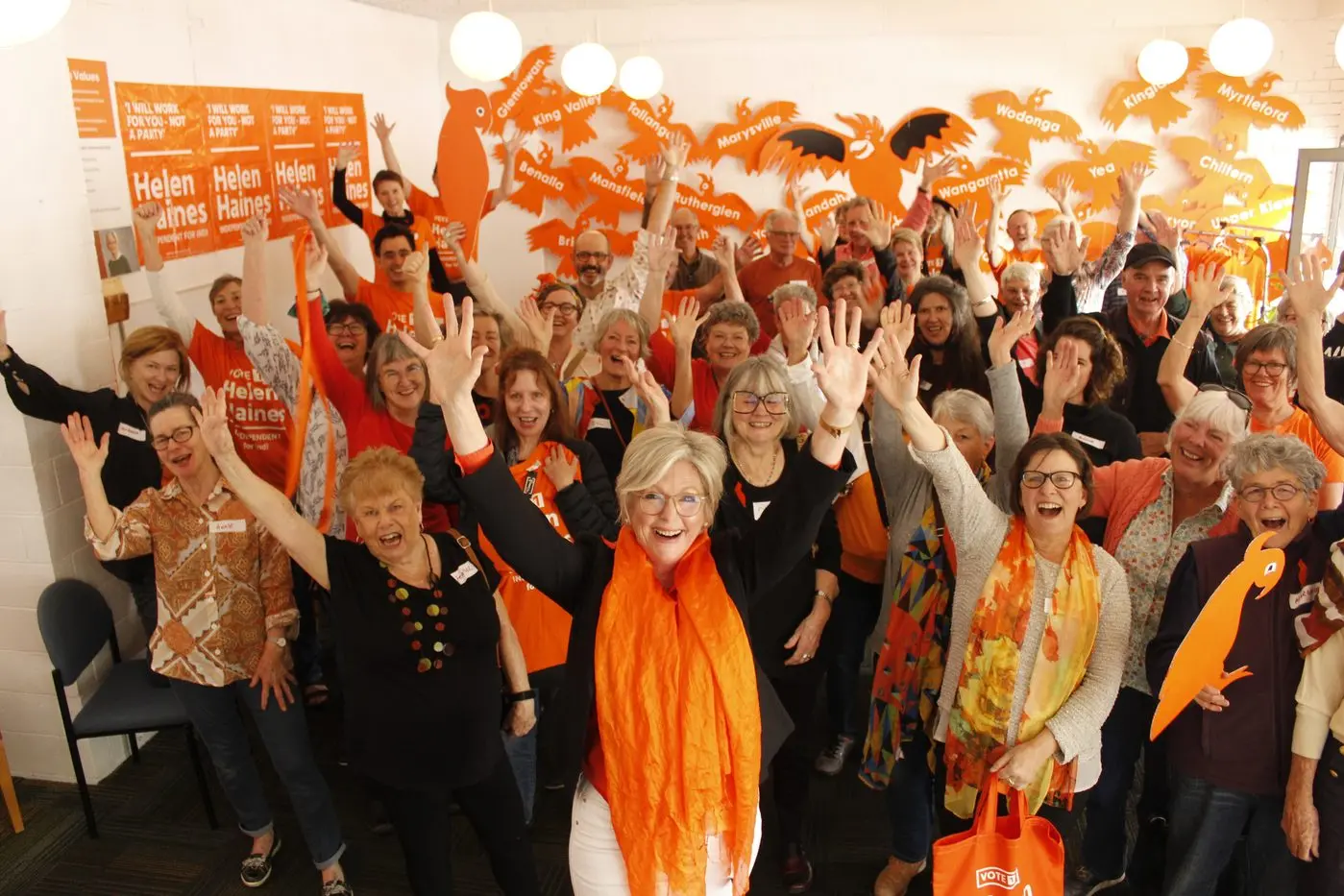 SO IT BEGINS: \\'Team Orange\\' volunteers were out in force on Saturday to open their Wangaratta hub, in support of the campaign to re\\u2013elect independent incumbent Helen Haines (front) as the federal member for Indi at the upcoming federal election. PHOTO: Jeff Zeuschner