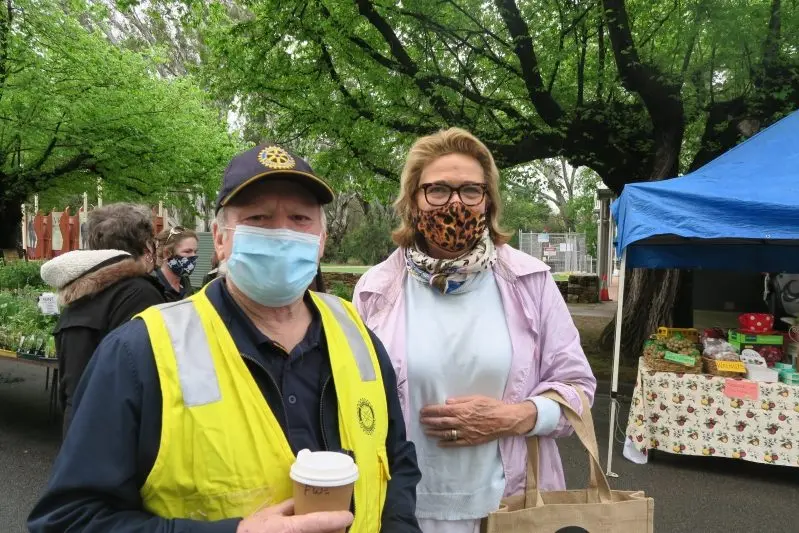 ENJOYING THE PRODUCE: Rotary volunteer Richard Knavle and Helen Waterworth both welcomed back the market this past weekend. PHOTO: Heather Bamford