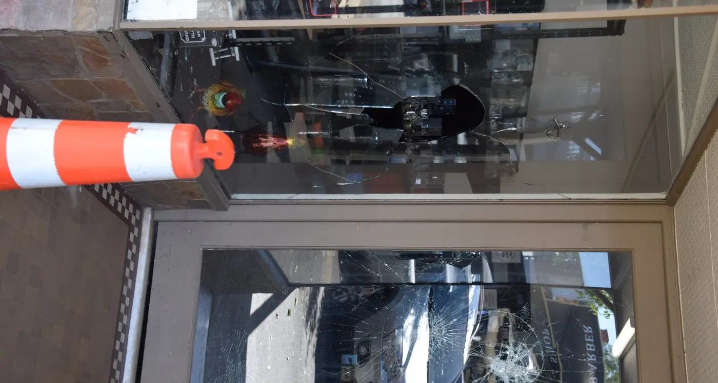 Thieves break through window