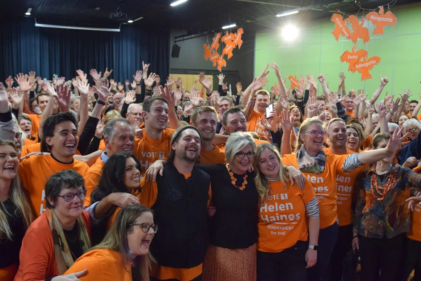 CAMPAIGN CELEBRATION: Independent member for Indi Helen Haines (centre front) celebrated her re\\u2013election to Federal Parliament with family and campaign volunteers at the Wangaratta Performing Arts Centre on Saturday night.  PHOTO: Brodie Everist Id:25164