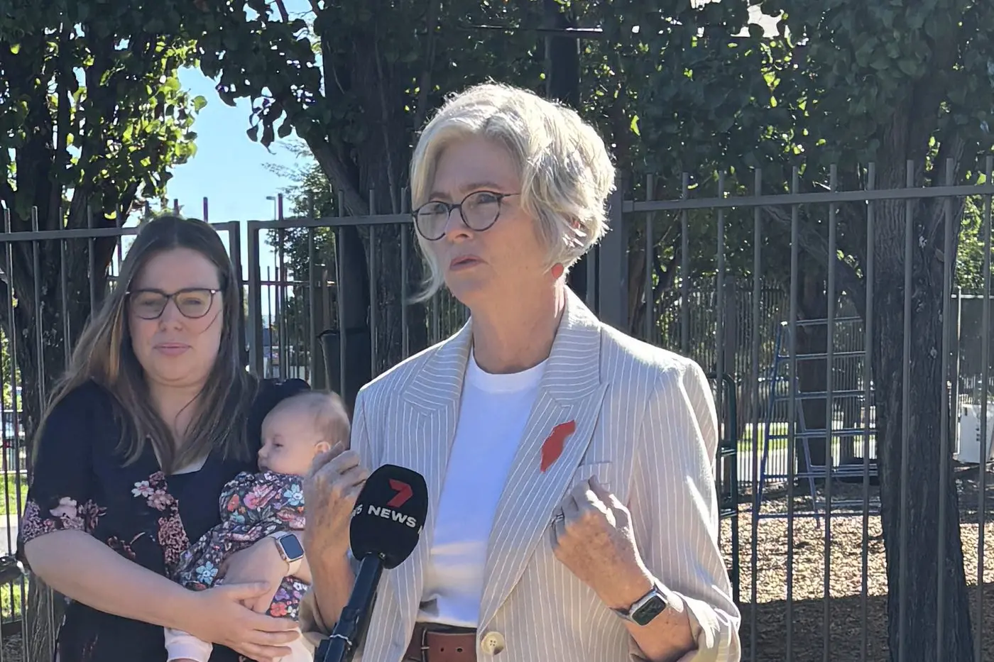 MORE STILL NEEDED: Indi MP Helen Haines with Claire Northfield and baby Hazel announcing the Independent\\'s childcare policies.