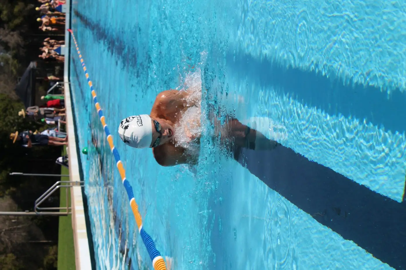 ALMOST PERFECT: Harrison Mills demonstrates precise breaststroke skills and wins this event.