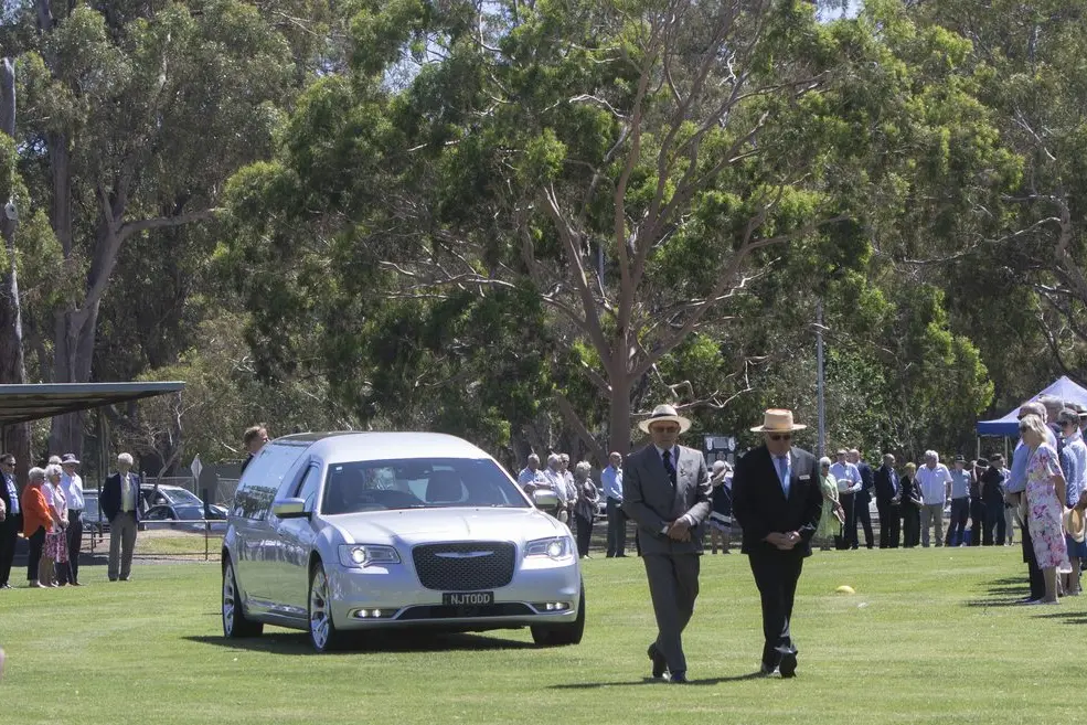 FUNERAL FOR A FOOTBALL LEGEND: About 300 people attended a funeral for Dick O\\'Bree at the Euroa Football Ground on Friday. The attendees formed a guard of honour. PHOTOS: Dale Mann