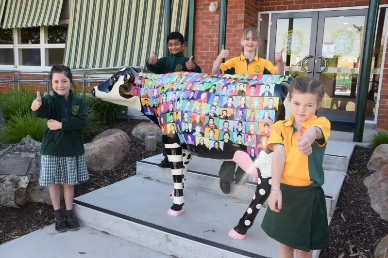 UDDER-LY GREAT: St John\\u2019s students Evie McMarton, Sineth Hasa, Grace Brown-Sarre and MacKenzie Hamil give their new Picasso Cow the thumbs up!