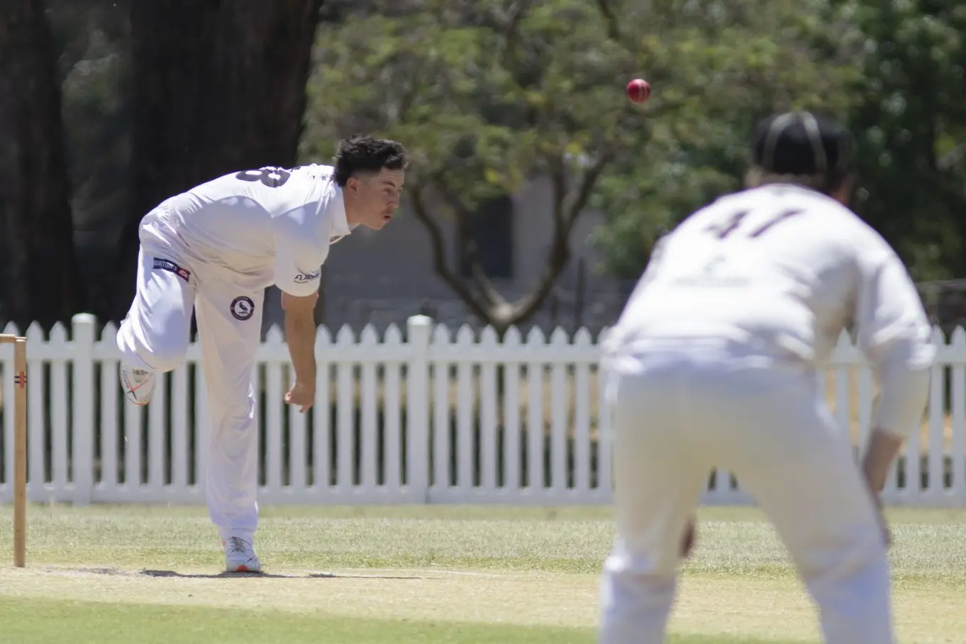 CHARGING IN: Darby Wilson powers through his run-up, on his way to four wickets. PHOTOS: Dale Mann