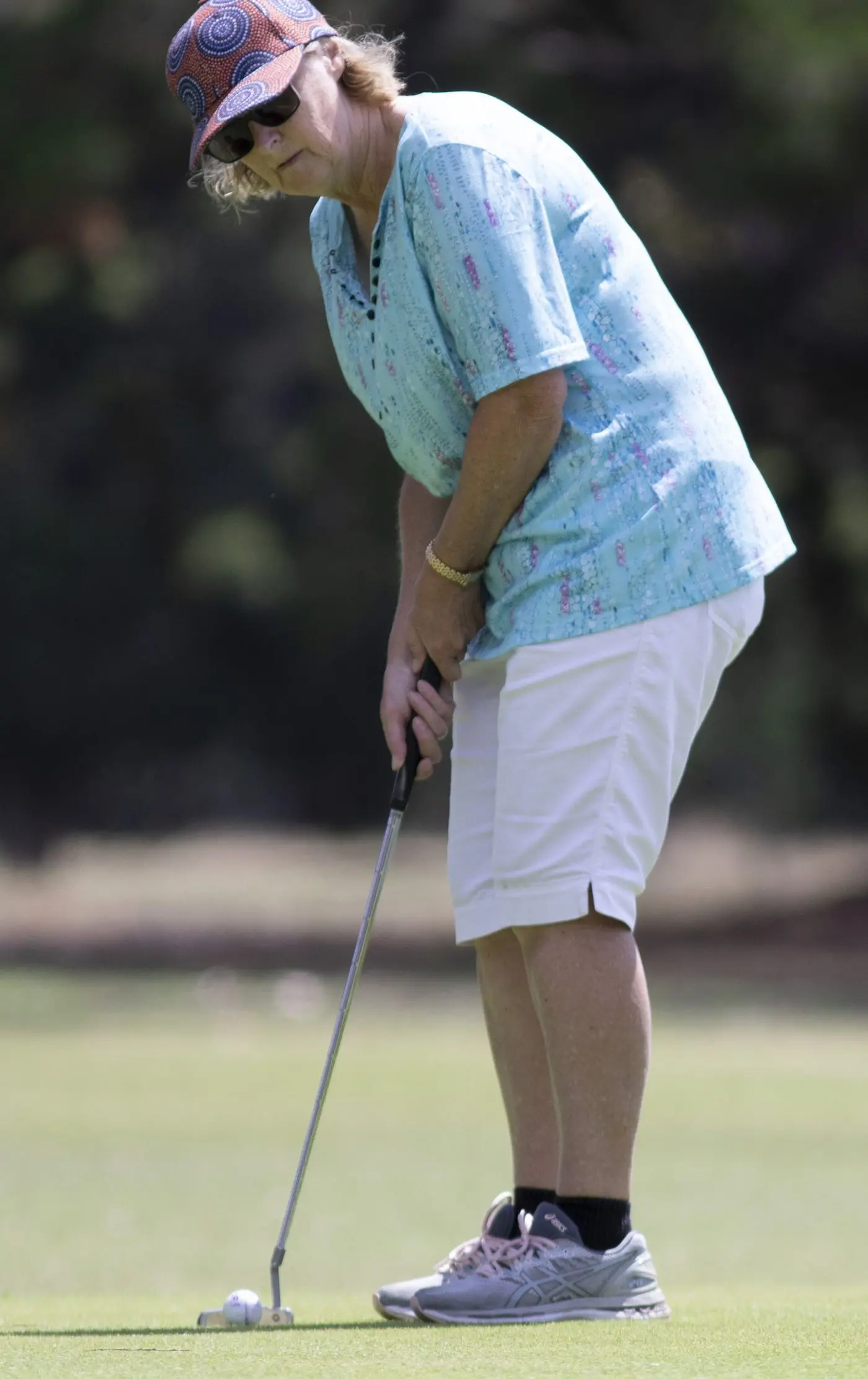 PUTTING CONFIDENCE: Faye Mollison lines up for a confident putt on the green. PHOTOS: Dale Mann