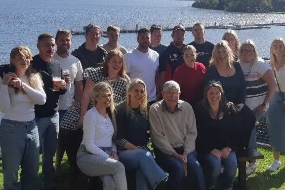 CELEBRATING 95: John Sanderson and his grandchildren at his 95th birthday party at the Nagambie Rowing Club last month. Id:40992