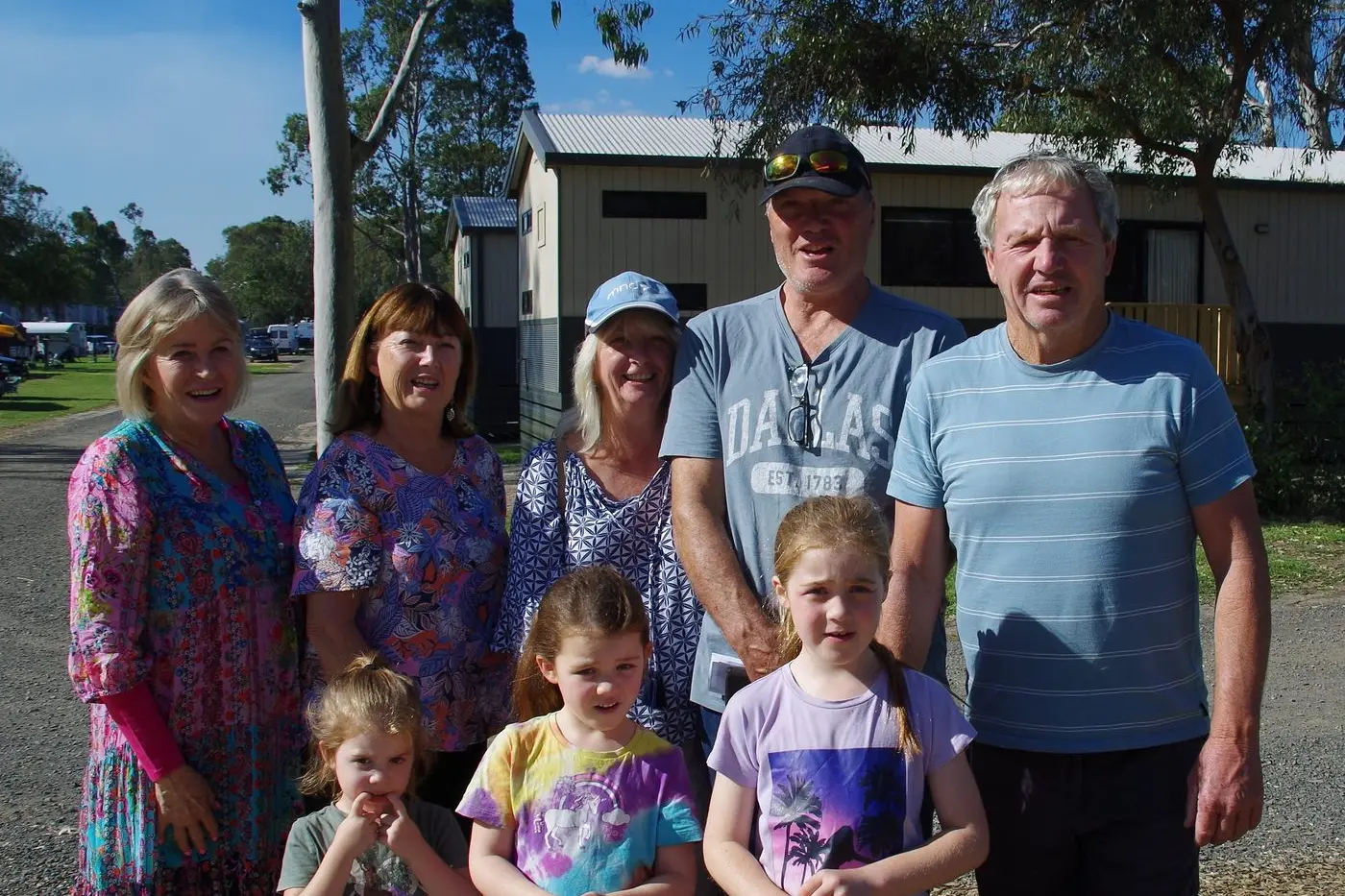 OPEN DAY: At one of the new cabins, local visitors to the Discovery Parks Nagambie re-opening, Leonie Fox from Shepparton, Karen Shiels, Michelle Lewis, Paul Lewis, Ed Shiels, and in front Anna Belle Shiels, Rosie Shiels and Delilah Shiels. PHOTOS: Di Grant