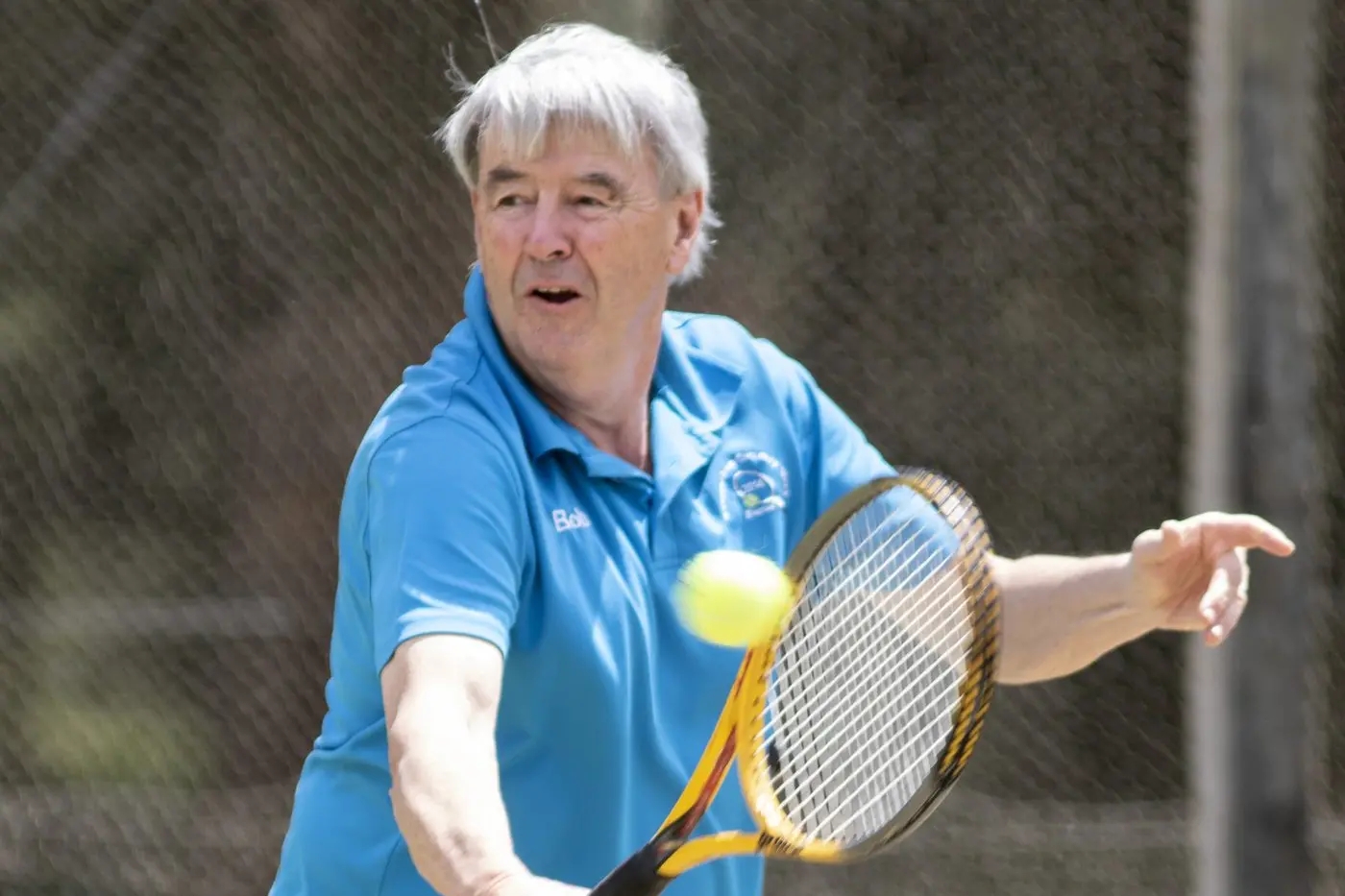 CLASSY PERFORMER: Bob Furphy takes to the tennis court with skilled prowess. PHOTOS: Dale Mann Id:33228