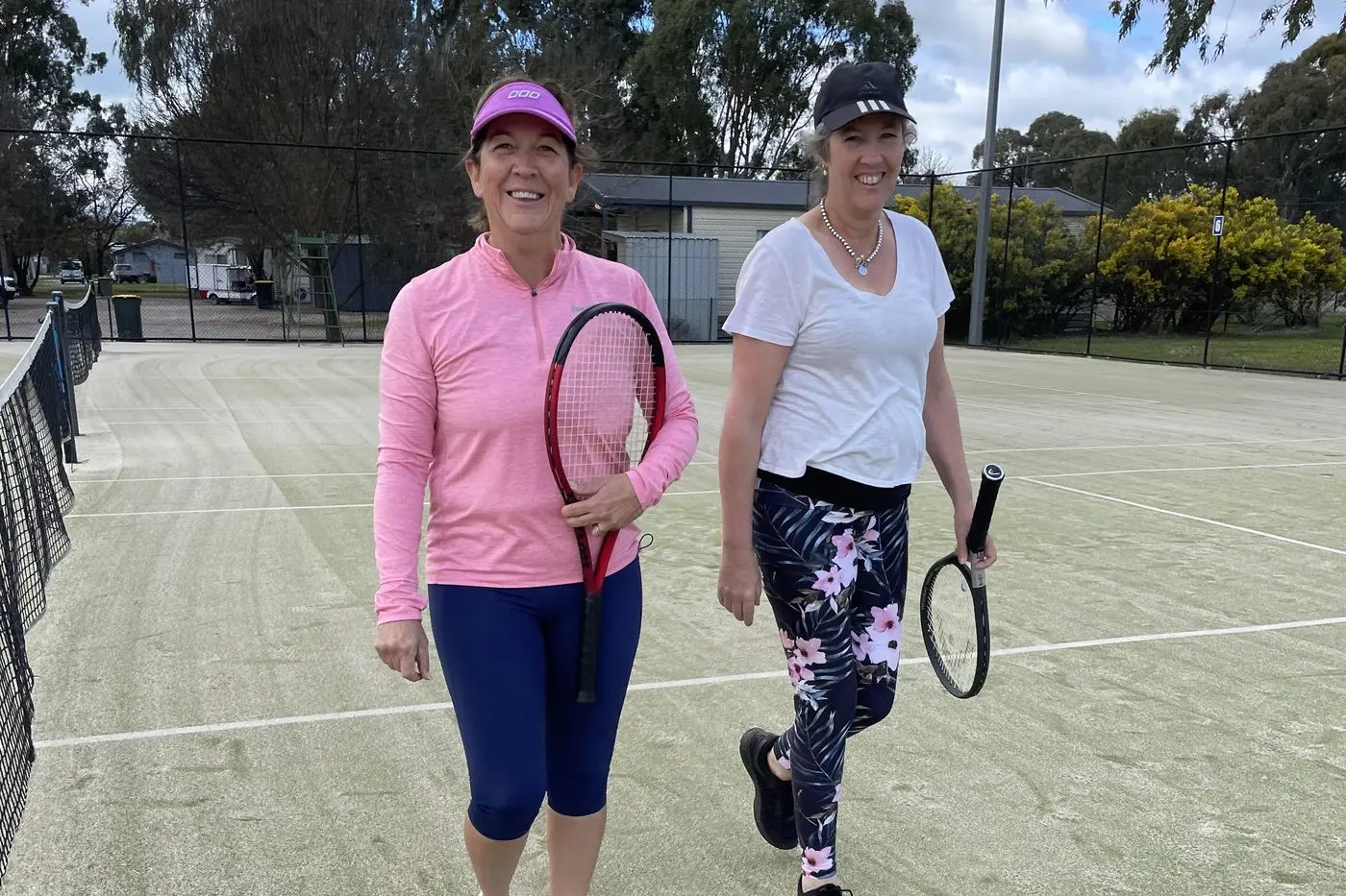 BEST PERFORMANCE YET: Liza Karras and Jenny Bell were delighted with their tiebreak set. PHOTO: Rhonda Carpenter