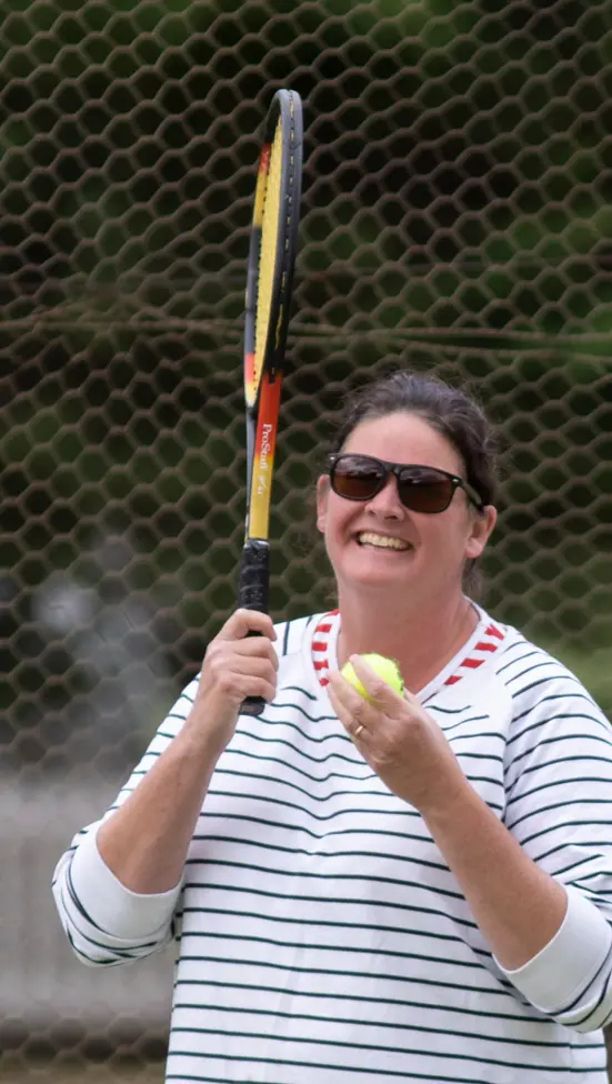 READY TO SERVE: Phoebe McDermont enjoys herself during a weekend tennis match.  Id:36927