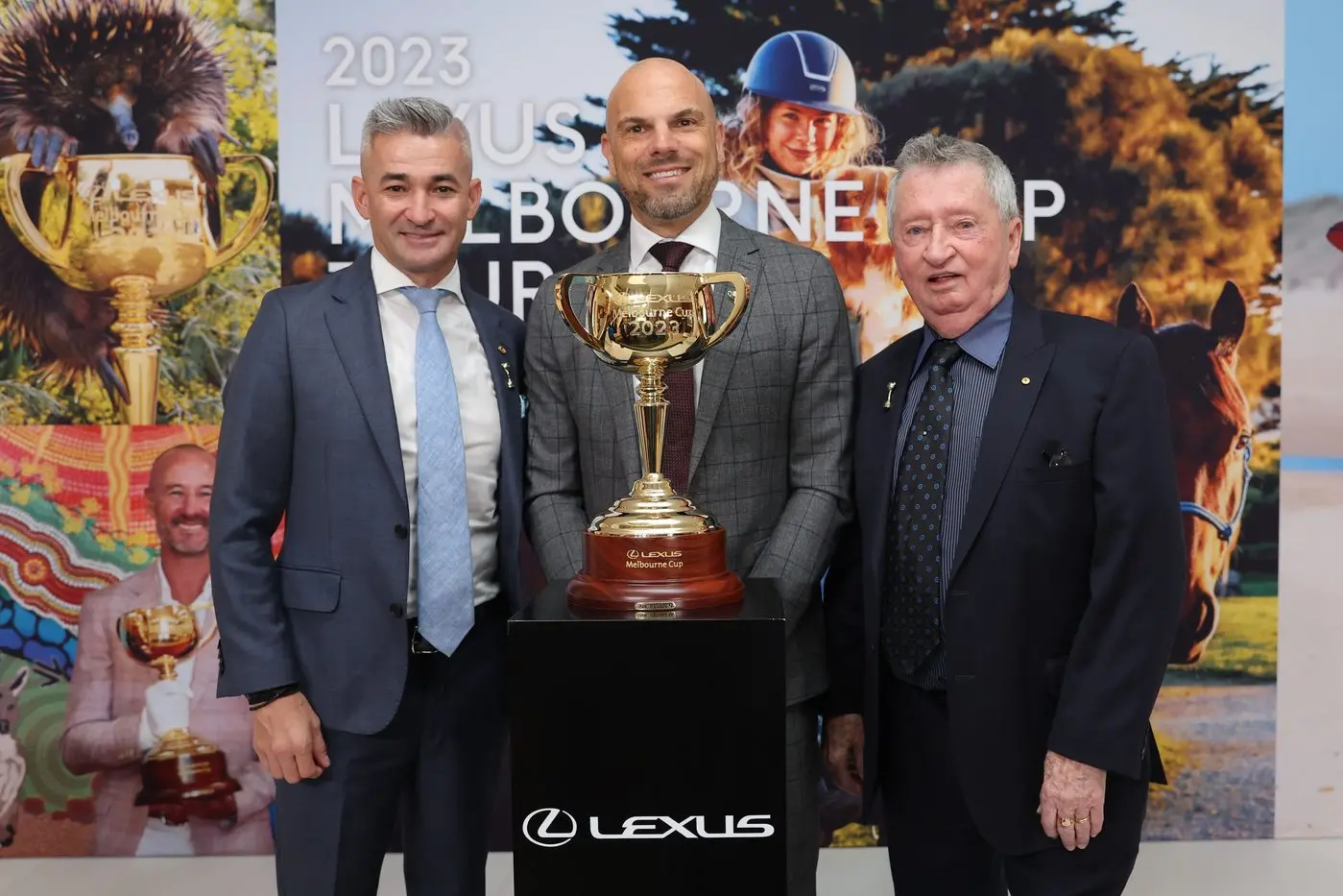 THE $600,000 TROPHY: Dual Melbourne Cup winning jockey and Lexus Ambassador Corey Brown, Lexus CEO John Pappas and dual Melbourne Cup\\u2013winning jockey John Letts with the $600,000 2023 trophy. PHOTO: Lucas Dawson Id:42309