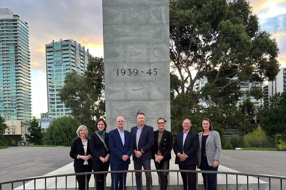 GALLIPOLI TOUR FOR THE RIGHT STUDENT: National Party members at the eternal flame at Melbourne\\'s War Memorial.