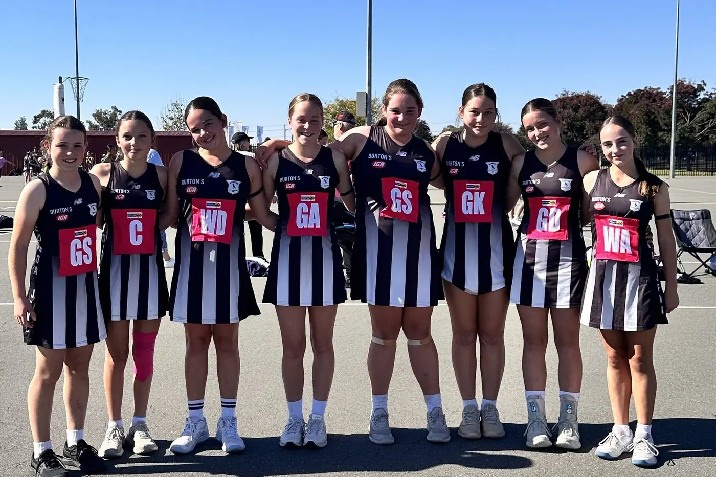 BIG WINNERS: The Under 13 Division one Euroa junior netball team three celebrates a dominant victory over the Shepparton Swans.