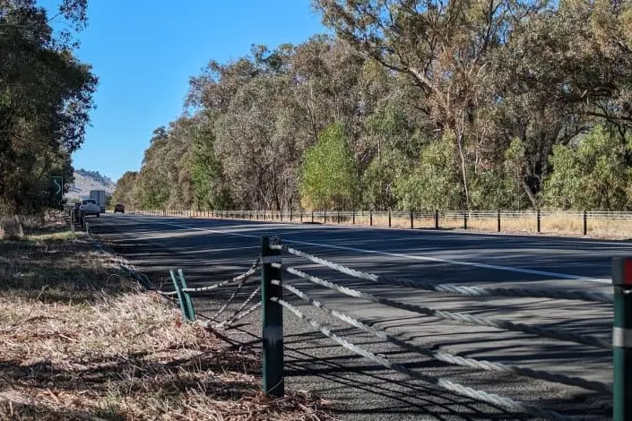 SAFETY COMPROMISED: Snapped safety barrier ropes along the Hume Freeway. PHOTO: Darren Chaitman