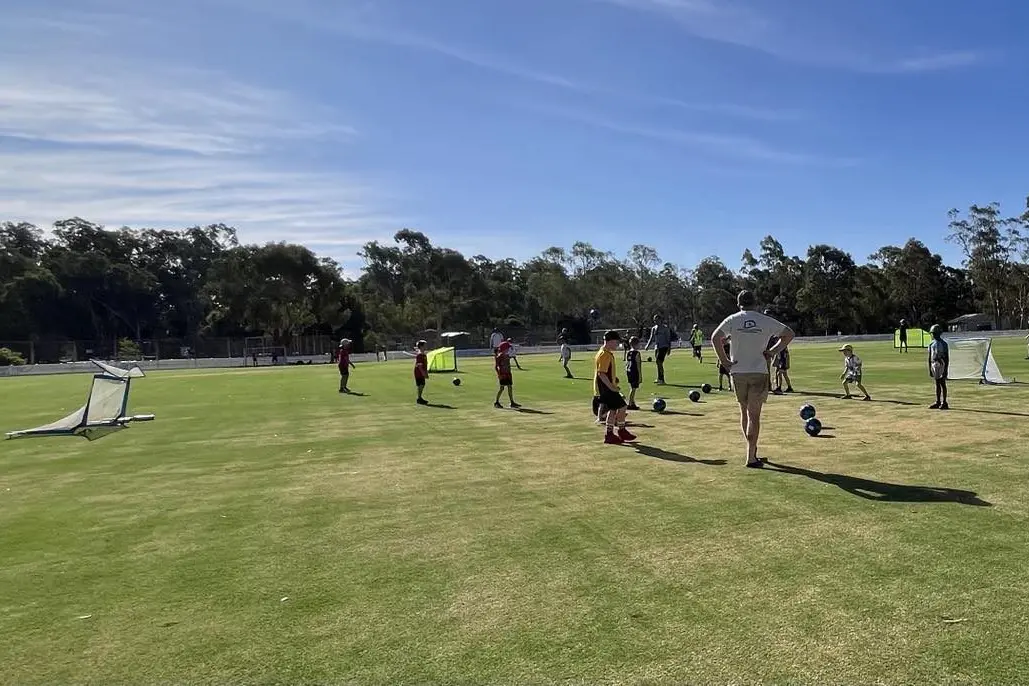 ALL HANDS ON DECK: Parents and volunteers helped oversee the first practice session for Euroa Junior Soccer Club\\'s eager young players.