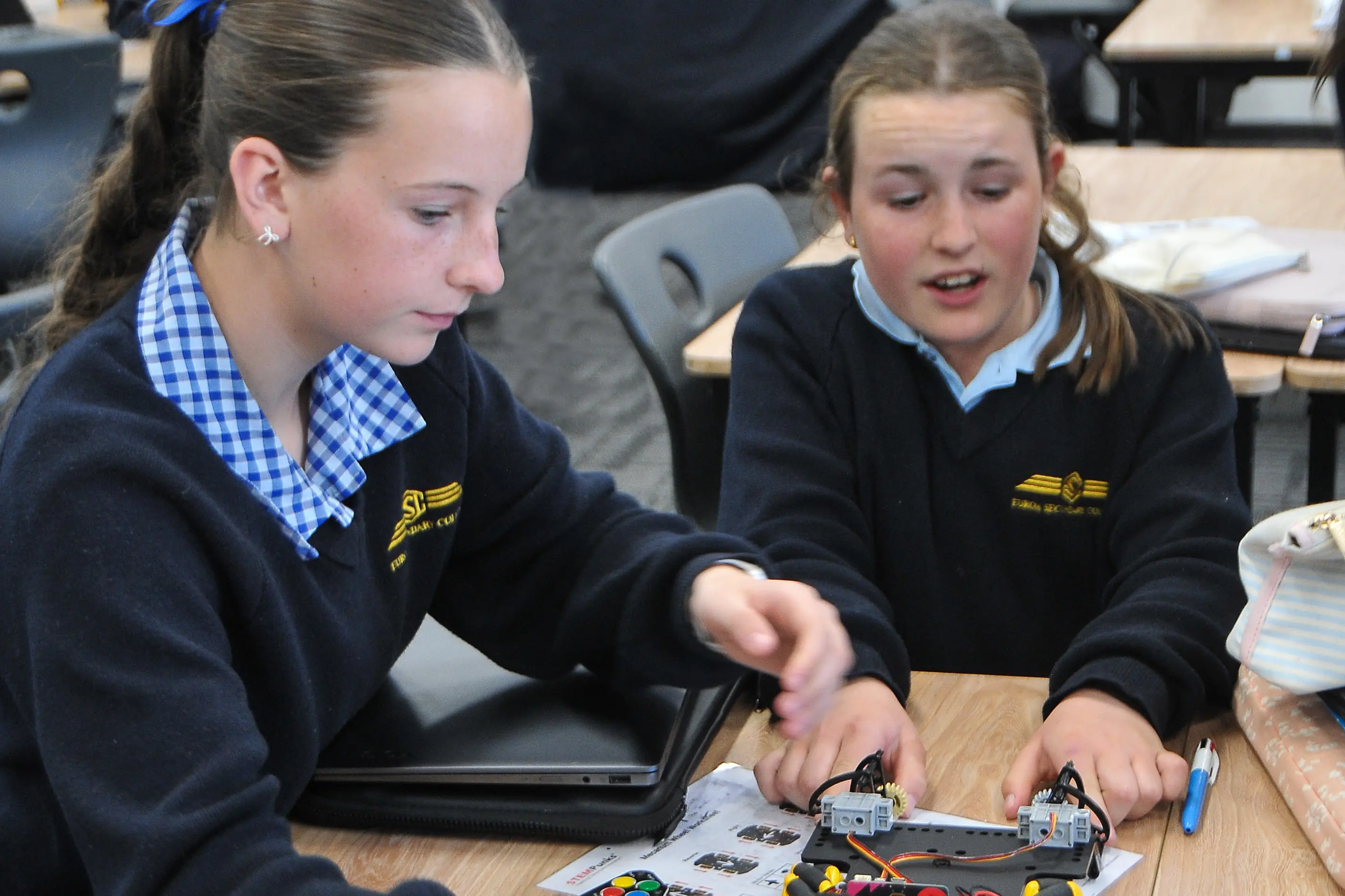 <p>COLLABORATION: Maggie Aldridge and Evie Buchanan get into the robot action. PHOTO: Lynnda Heard</p>\\n